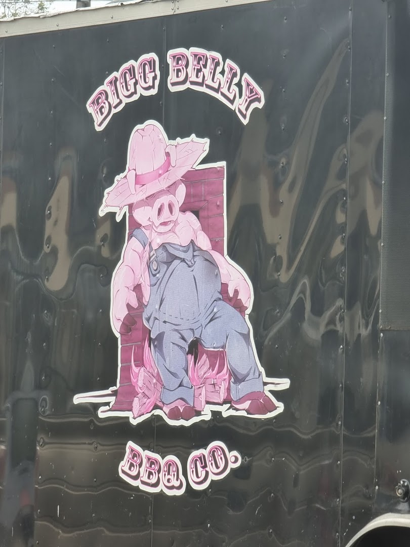 Close-up of the Bigg Belly BBQ Co. pig mascot logo painted on the side