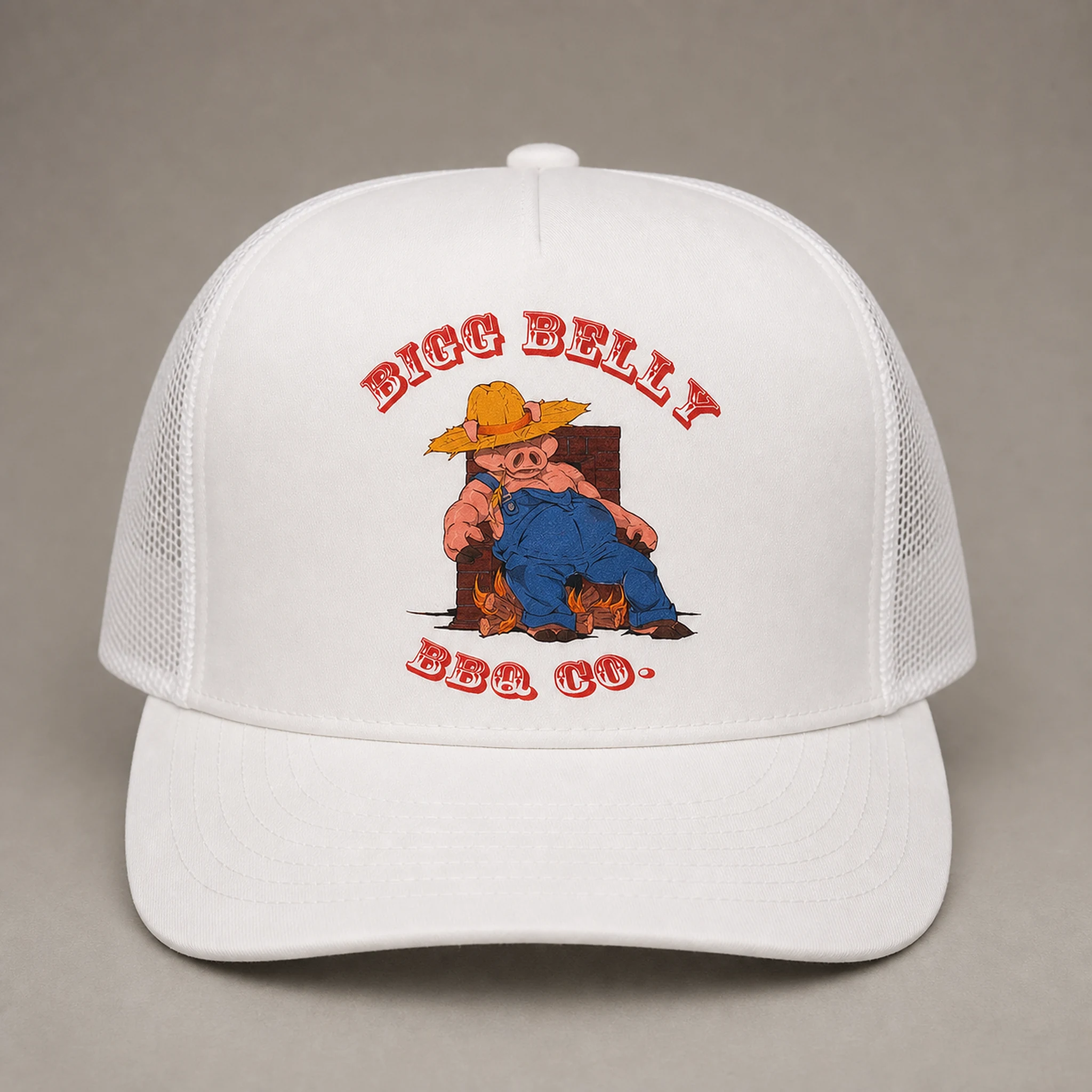 Bigg Belly BBQ Co. all-white trucker hat with a white structured front, white mesh sides and back, and the full-colour Bigg Belly pig artwork printed on the front
